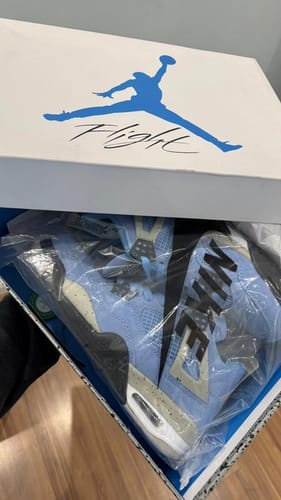 Customer photo: Air Jordan 4 Retro "University Blue"